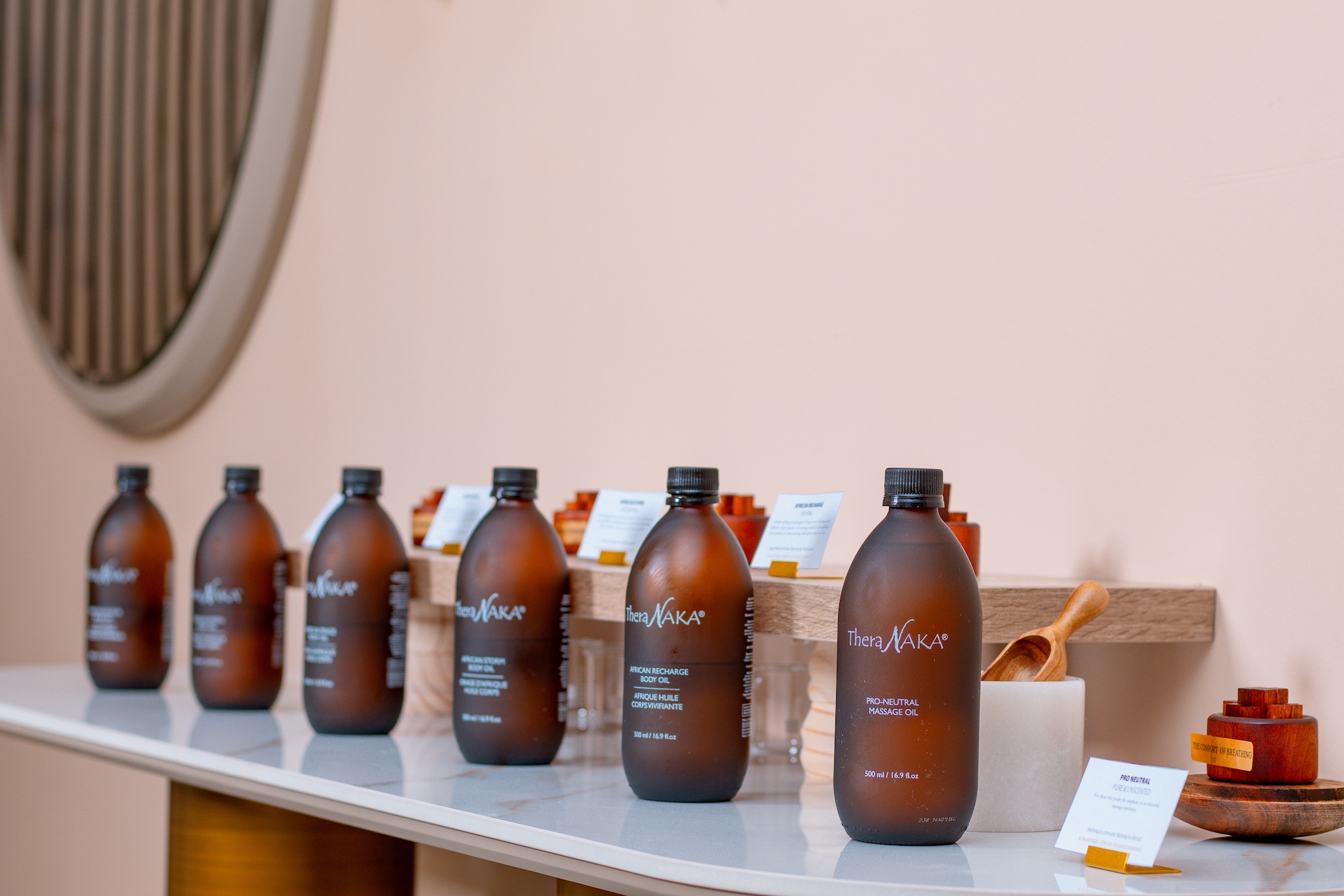 Spa oils and skincare displayed on a shelf