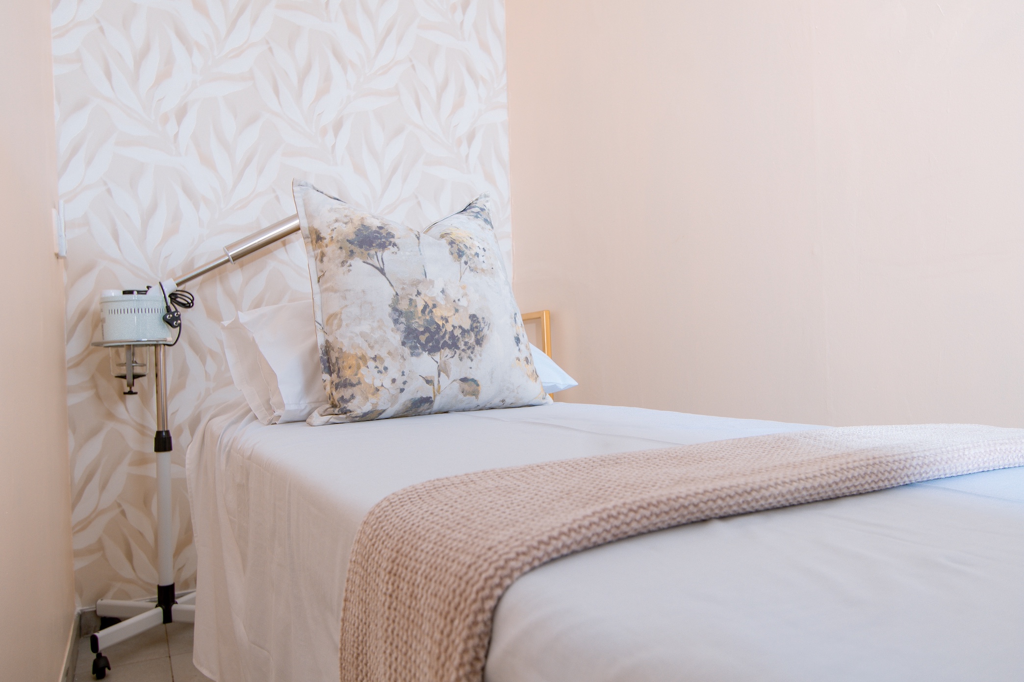 A spa treatment bed prepared for a guest